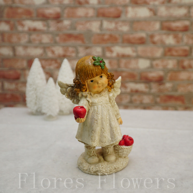Anjel dievčatko s jablčkami